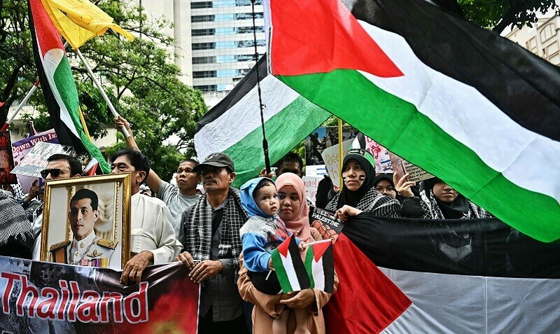 People take part in a pro-Palestinian rally in front of the Israeli Embassy in Bangkok on October 21, 2023. &mdash; AFP