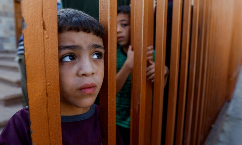 A mourner reacts near the bodies of Palestinians killed in Israeli strikes during their funeral, in Khan Younis in the southern Gaza Strip on October 31. &mdash; Reuters