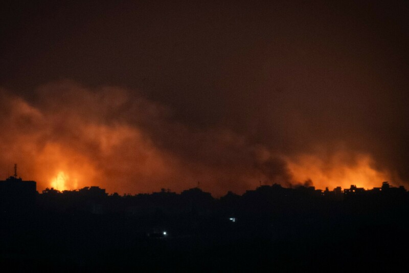 A picture taken from Sderot along the border with the Gaza Strip early on November 5 shows smoke and fire rising over the Palestinian enclave during an Israeli strike. &mdash; AFP