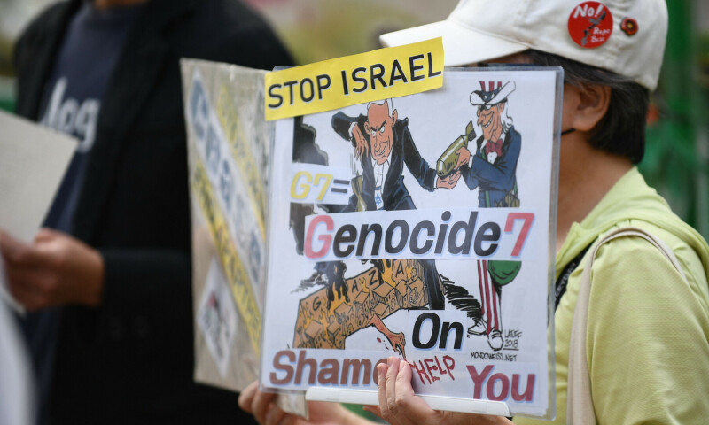  Protesters stage an anti-war rally near Japan&rsquo;s Ministry of Foreign Affairs Iikura Guest House in Tokyo on Nov 7, 2023 where the G7 Foreign Ministers&rsquo; Meeting was set to shortly begin. &mdash; AFP photos 
