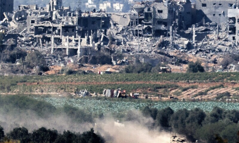 An Israeli army battle tank moves at a position in the Gaza Strip across the border from southern Israel on November 8, 2023. — AFP