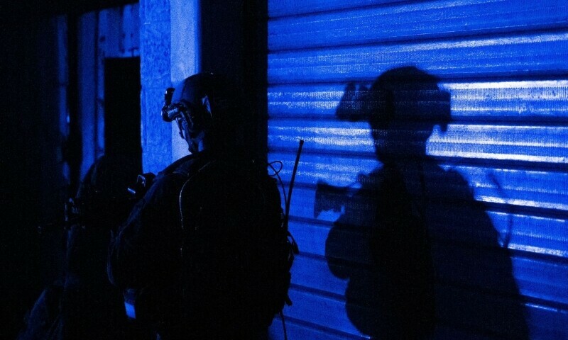 This handout picture released by the Israeli army on November 15, 2023, shows soldiers during a military operation around at Al-Shifa hospital in Gaza City. &mdash; AFP