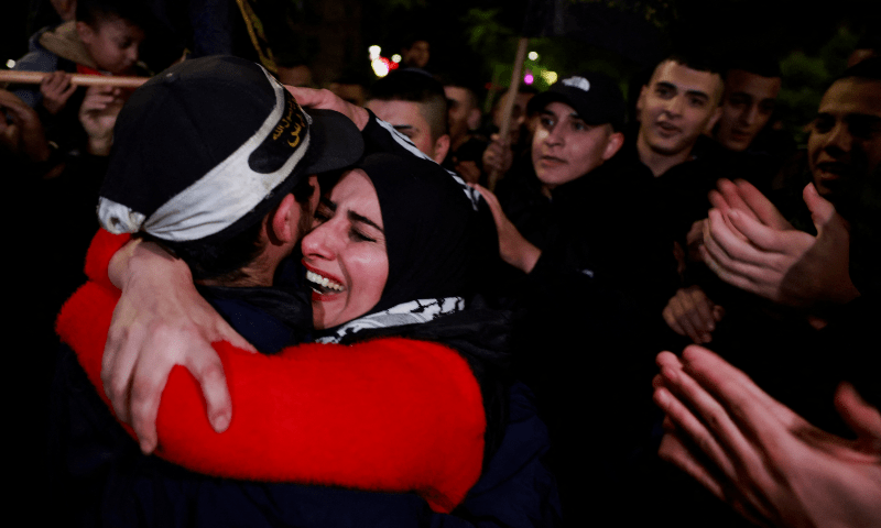  A Palestinian prisoner hugs his mother after being released in Ramallah, in the Israeli-occupied West Bank on Dec 1, 2023. &mdash; Reuters 