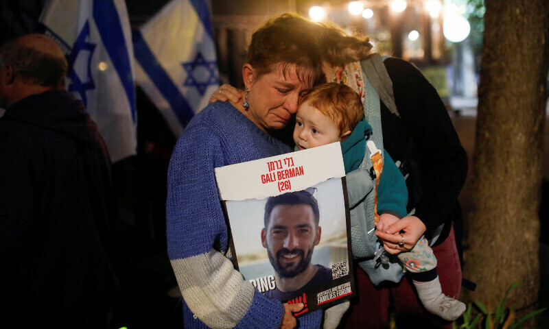 Family members of hostages kidnapped by Hamas during the deadly Oct 7 attack, gather to mark the first night of Hanukkah, in Karmiel, in northern Israel on Dec 7, 2023. — Reuters