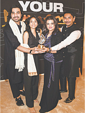 IN FLAMES’ cast Omair Javaid, Ramesha Nawal and Bakhtawar Mazhar and producer Shant Joshi pose with the award.—Courtesy Red Sea International Film Festival