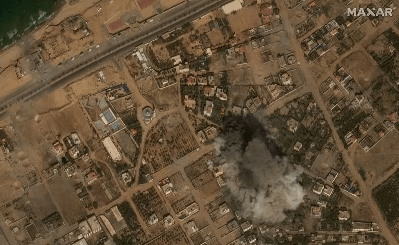 A satellite view of an explosion near the coast of Gaza amid Israeli airstrikes in October. &mdash; Reuters