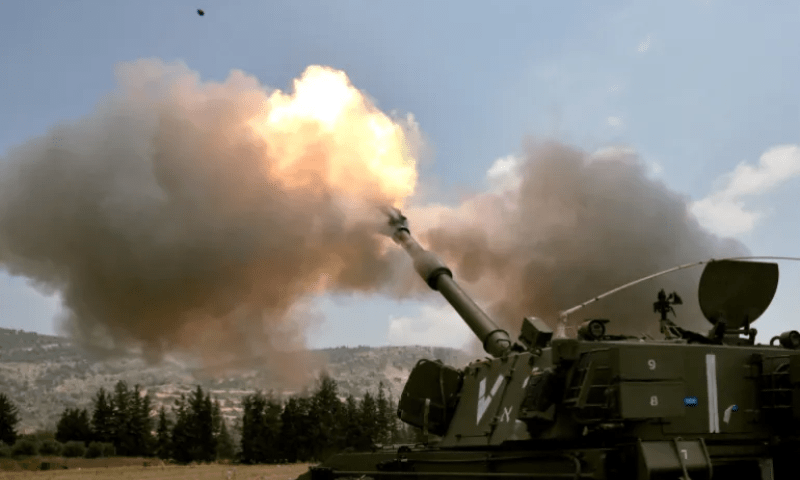 An Israeli tank fires a shell towards Lebanon from a position near the northern Israeli town of Shlomi. &mdash; Reuters