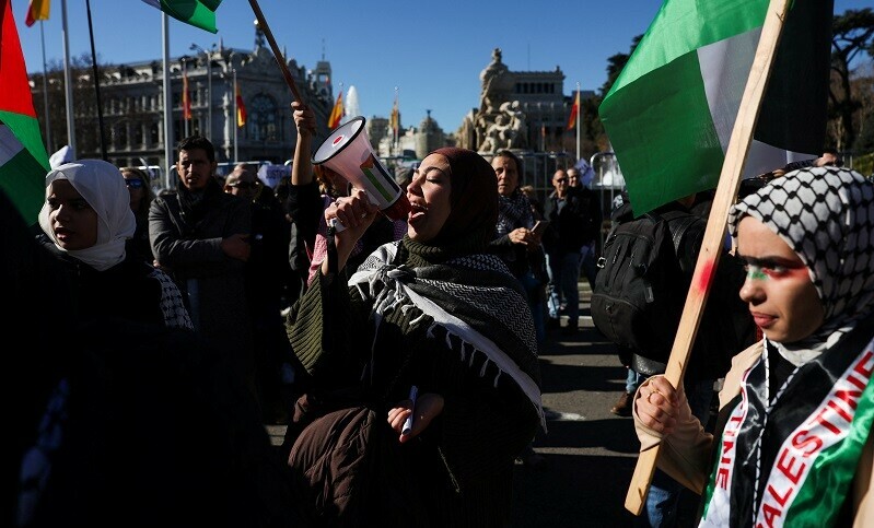 A group of young women protest to call for a ceasefire in Gaza to mark 100 days since the start of the conflict between Israel and the Palestinian group Hamas, in Madrid, Spain, January 20, 2024. &mdash; Reuters