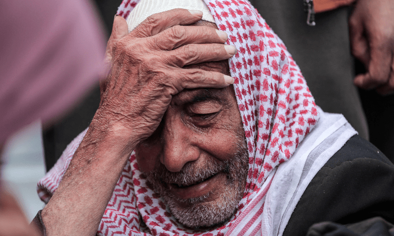  A Palestinian man mourns a relative killed during overnight Israeli bombardment on Deir al-Balah in the central Gaza Strip, at the morgue of the Shuhada al-Aqsa on March 1, 2024. &mdash; AFP 