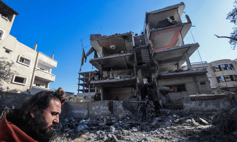  A man inspects the damage to a building after overnight Israeli bombardment in Rafah in the southern Gaza Strip on March 25, 2024. &mdash; AFP 