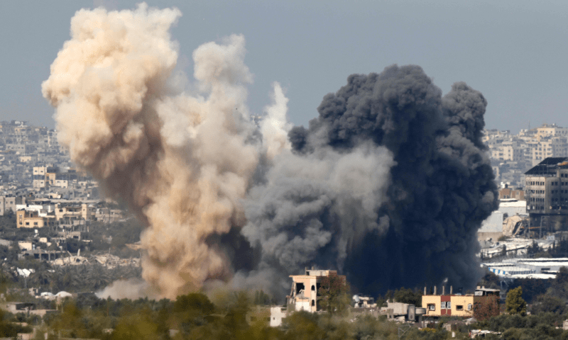  This picture taken from Israel&rsquo;s southern border with the Gaza Strip shows smoke billowing following an Israeli strike in the besieged Palestinian territory on March 27. &mdash; AFP 