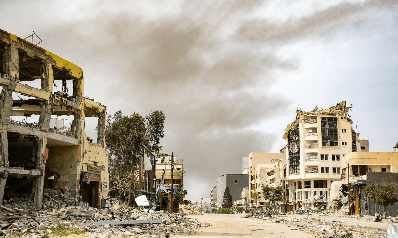  Smoke rises during an Israeli strike in the vicinity of the al-Shifa hospital in Gaza City on March 28. &mdash; AFP 