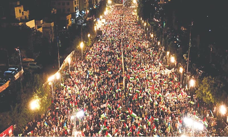  Workers and supporters of the Jamaat-i-Islami (JI) participate in a rally on Shahrah-i-Quaideen to express solidarity with the people of Gaza.&mdash;PPI 