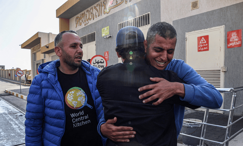 Relatives and friends mourn the death of Saif Abu Taha, a staff member of World Central Kitchen who was killed as Israeli strikes hit a convoy of the NGO a day earlier, during his funeral in Rafah in the southern Gaza Strip on April 2. — AFP