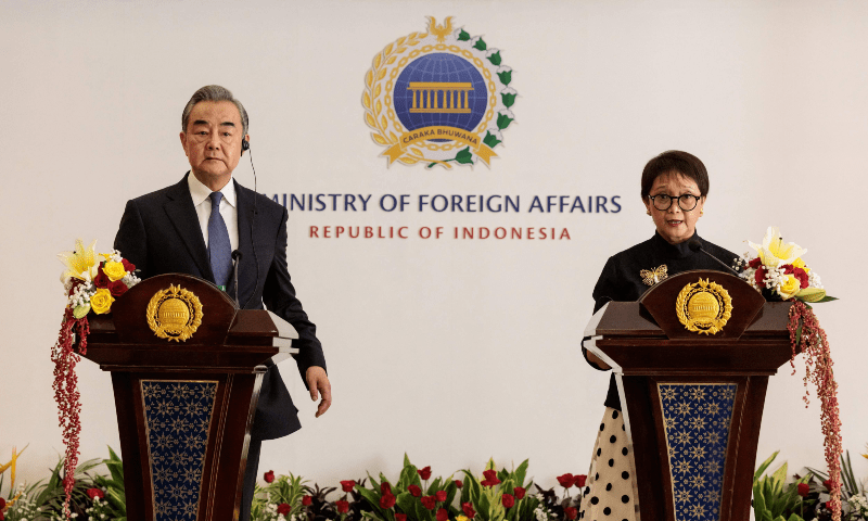  China&rsquo;s FM Wang Yi (L) and Indonesia&rsquo;s FM Retno Marsudi attend a press conference after their bilateral meeting at the Foreign Ministry office in Jakarta on April 18. &mdash; AFP 