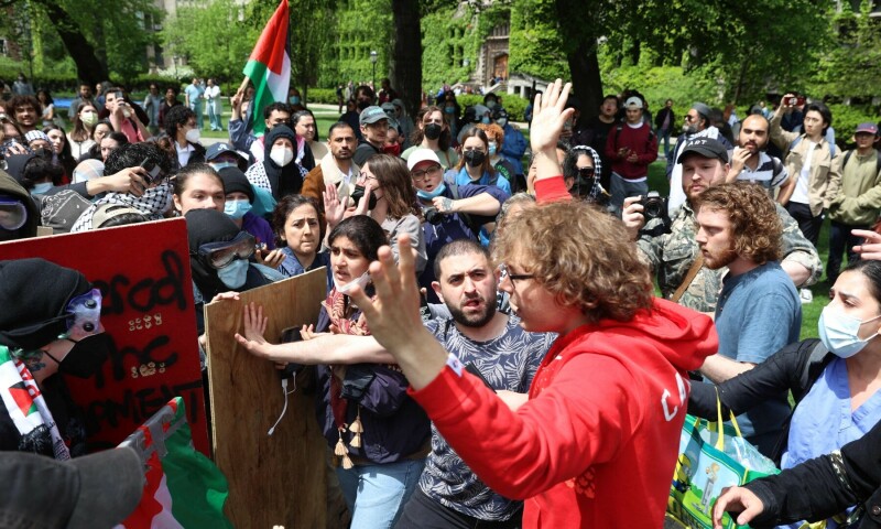  Pro-Palestinian student protestors and activists clash with counter-protesters during a rally on the campus of University of Chicago in Chicago, Illinois, on May 3. &mdash; AFP 