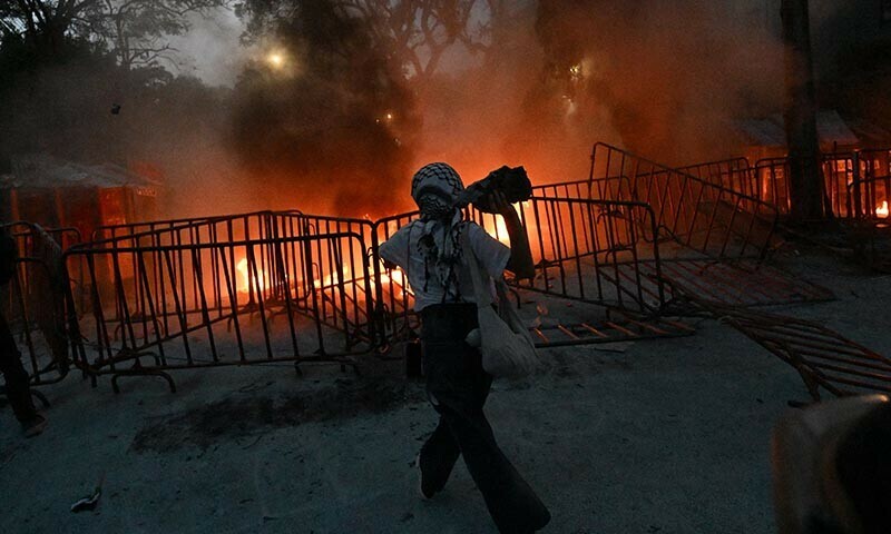 A woman takes part in a pro-Palestinian rally called “Urgent action for Rafah” in front of the Israeli embassy in Mexico City on May 28. — AFP