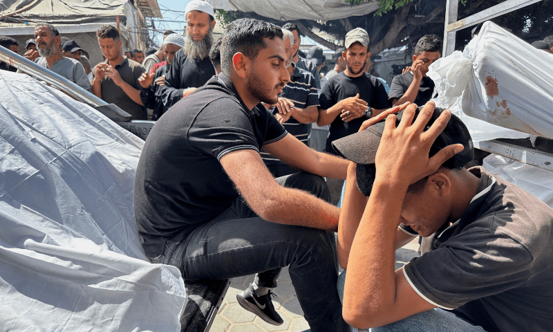 Mourners react during the funeral of Palestinians killed in Israeli strikes in Deir Al-Balah, in central Gaza Strip on June 8, 2024. — Reuters
