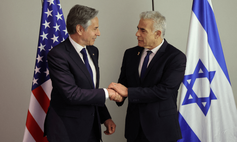  US Secretary of State Antony Blinken shakes hands with Israeli opposition leader Yair Lapid during a meeting in Tel Aviv on June 11, 2024. &mdash; Reuters 