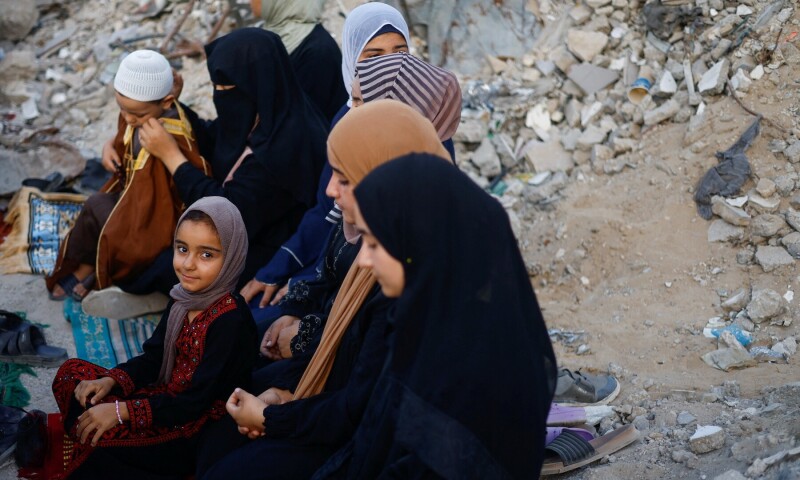 Palestinians hold Eidul Azha prayers by the ruins of the Al-Rahma mosque destroyed by Israeli air strikes, amid the Israel-Hamas conflict, in Khan Younis, in the southern Gaza Strip on June 16, 2024. &mdash; Reuters