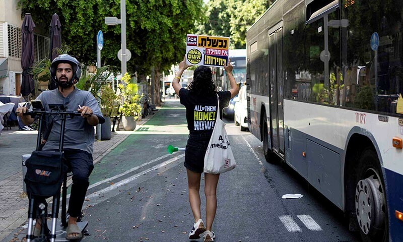  A demonstrator holds up a sign that reads &ldquo;You failed. There&rsquo;s no forgiveness. Elections!&rdquo; during a demonstration in Tel Aviv calling for the immediate return of hostages held in Gaza on June 26. &mdash; Reuters 