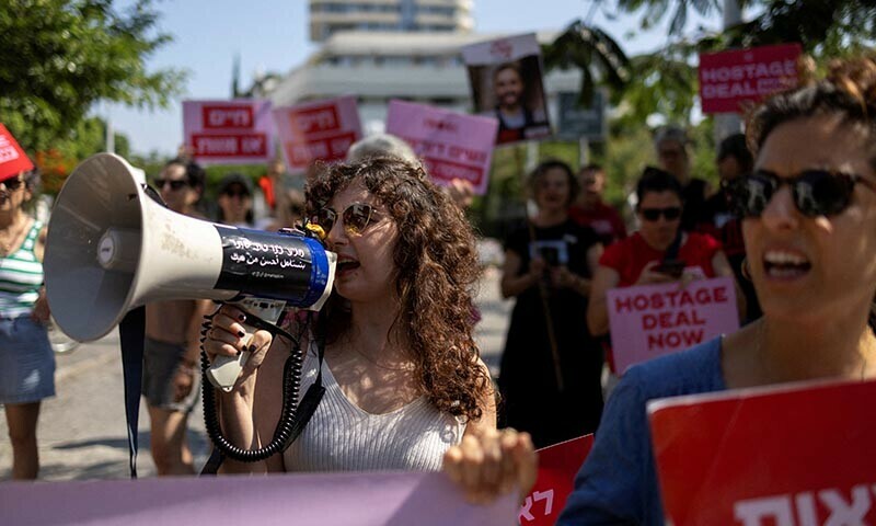  People attend a demonstration at Dizengoff Square in Tel Aviv calling for the immediate return of hostages held in Gaza on June 26. &mdash; Reuters 