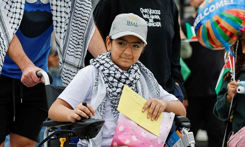  Baylasan, a 10-year-old amputee Palestinian girl, is welcomed at Washington Dulles International Airport on August 31. &mdash; Reuters 