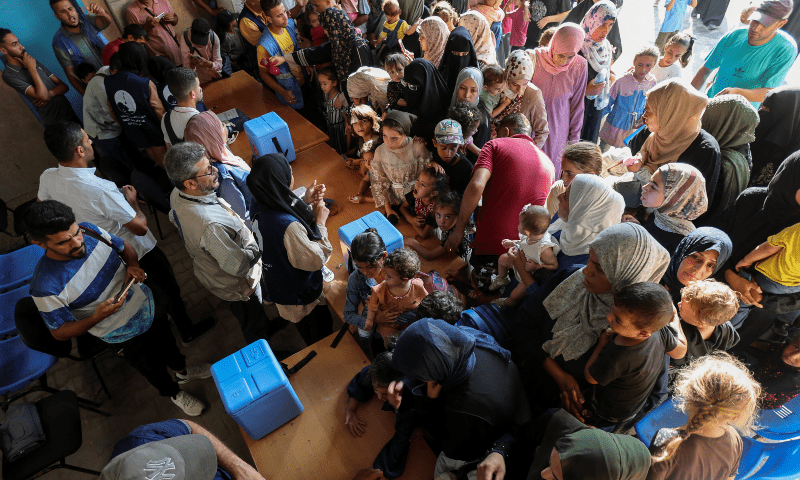  Palestinians gather for a polio vaccination campaign, at a United Nations healthcare center in Deir Al-Balah in the central Gaza Strip, on Sept 1, 2024. Reuters/Ramadan Abed 