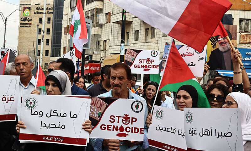Palestinian protesters shouts slogans during a rally to mark the anniversary of Palestinian militant group Hamas&rsquo; October 7, 2023 attack on Israel, in Ramallah in the occupied West Bank on October 7, 2024. &mdash; AFP