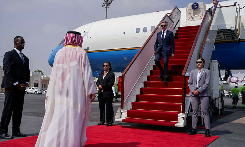 Ambassador of the United States to Qatar Timmy Davis and Qatari Ministry of Foreign Affairs Chief of Protocol Ibrahim Fakhroo standby as US Secretary of State Antony Blinken arrives in Doha, Qatar on October 24. &mdash; Reuters
