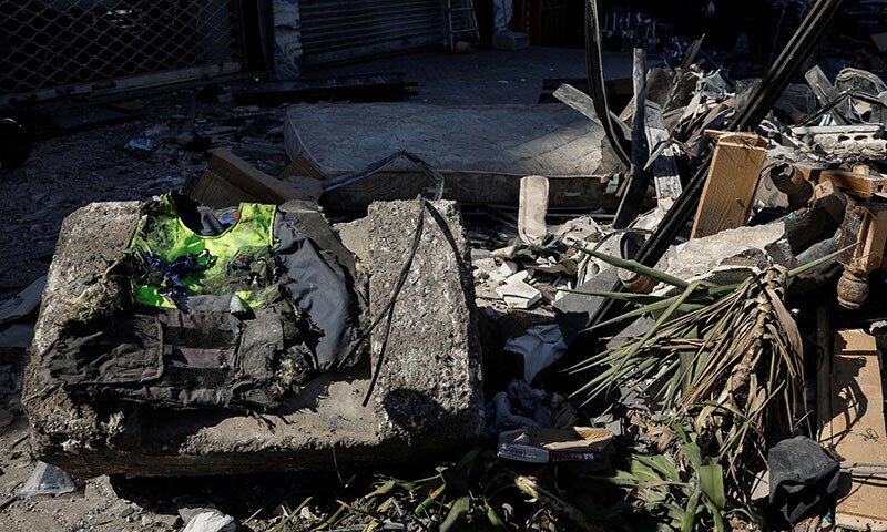 A flak jacket of a worker from the Islamic Health Organisation, which was being hosted in the building damaged by an Israeli strike on central Beirut&rsquo;s Bachoura neighbourhood, lays in rubble in Beirut, Lebanon on October 3.  &mdash; Reuters