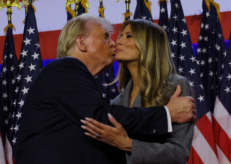 Republican presidential nominee and former U.S. President Donald Trump kisses his wife Melania at his rally, at the Palm Beach County Convention Center in West Palm Beach, Florida, US on November 6. &mdash; Reuters