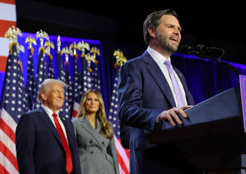 Republican vice presidential nominee JD Vance speaks as Republican presidential nominee and former US President Donald Trump and his wife Melania watch as he addresses supporters at Trump&rsquo;s rally, at the Palm Beach County Convention Center in West Palm Beach, Florida, US on November 6. &mdash; Reuters