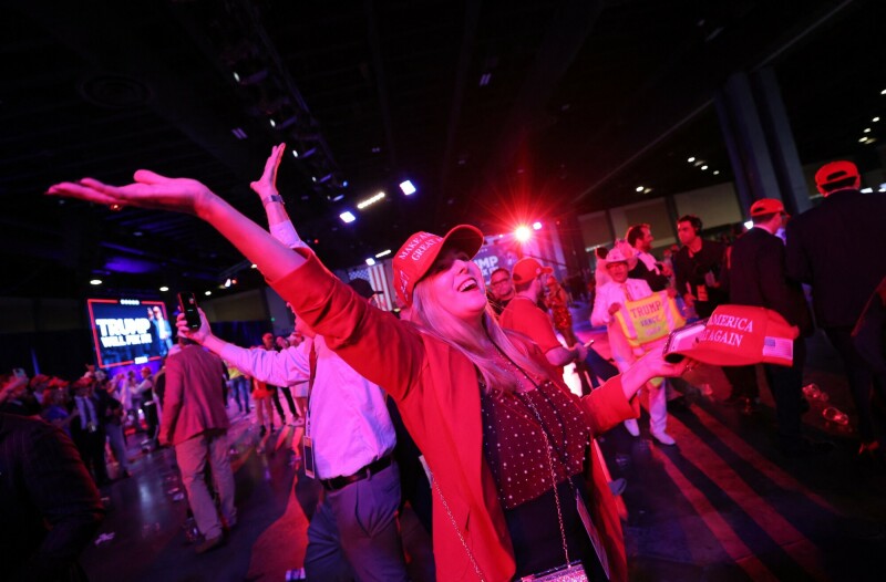 A supporter of Republican presidential nominee and former U.S. President Donald Trump celebrates at his rally, at the Palm Beach County Convention Center in West Palm Beach, Florida, US on November 6. &mdash; Reuters