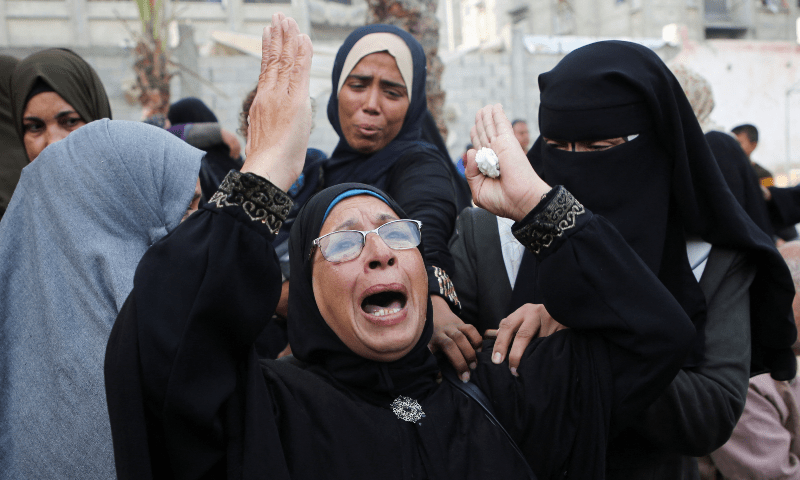  A woman reacts as people mourn Palestinians killed in Israeli strikes, at Nasser hospital in Khan Younis in the southern Gaza Strip on November 9. &mdash; Reuters 