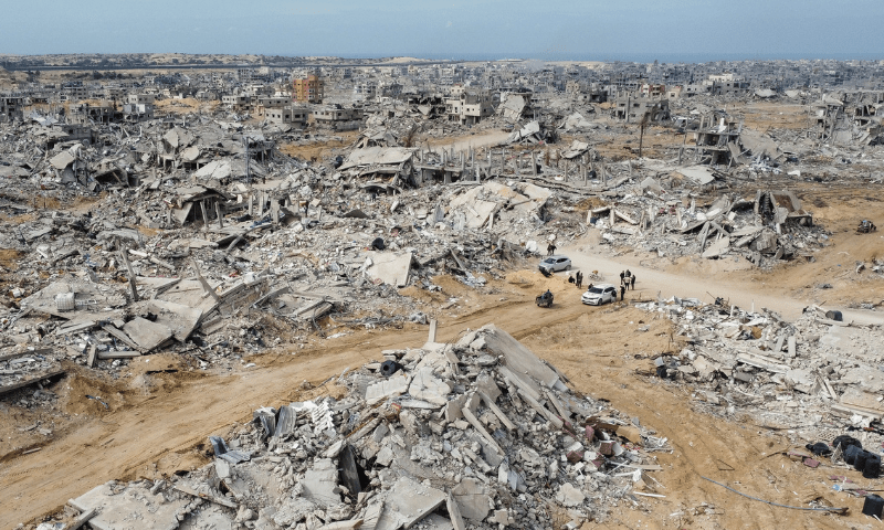 A drone view shows Palestinian houses and buildings lying in ruins, following a ceasefire between Israel and Hamas, in Rafah in the southern Gaza Strip on January 22. &mdash; Reuters