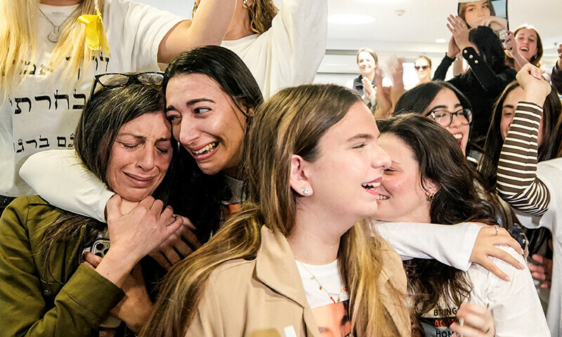 Family members and supporters of Israeli hostage Agam Berger, a soldier who was seized from her army base in southern Israel during the deadly October 7, 2023, attack by Hamas, react as they watch a broadcast of Berger during her release, in Holon, Israel January 30. &mdash; Reuters