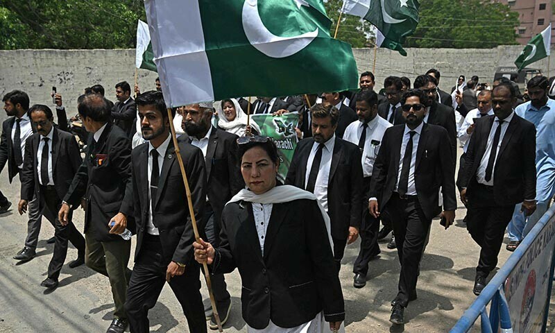 Lawyers in Karachi march in support of the Pakistan armed forces on May 9. &mdash; AFP