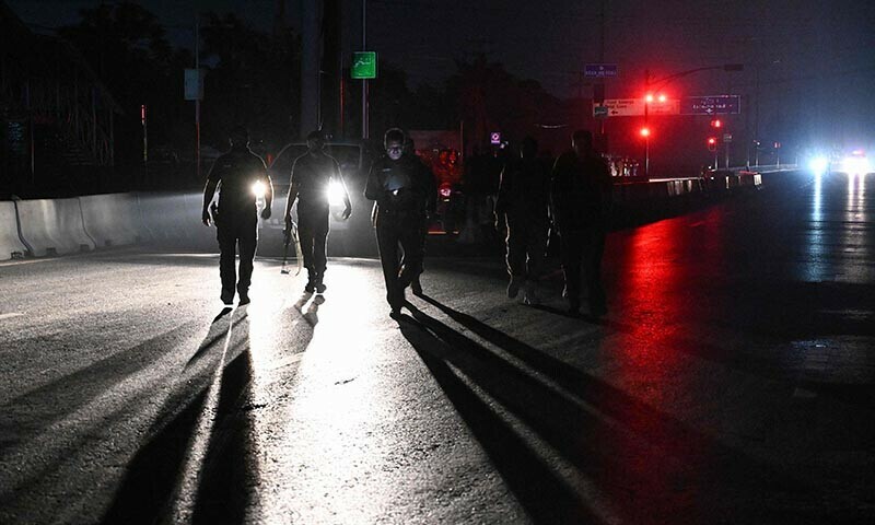 Security personnel cordon off a road near Nur Khan military airbase after Indian strikes in Rawalpindi on May 10. &mdash; AFP