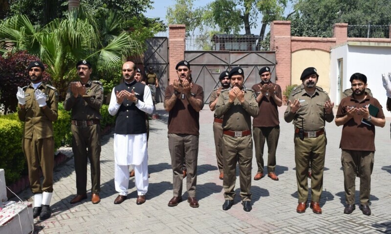  Rescue 1122 officials mark Youm-i-Tashakur in Peshawar on Friday, May 16, 2025. — Photo by Umar Bacha 