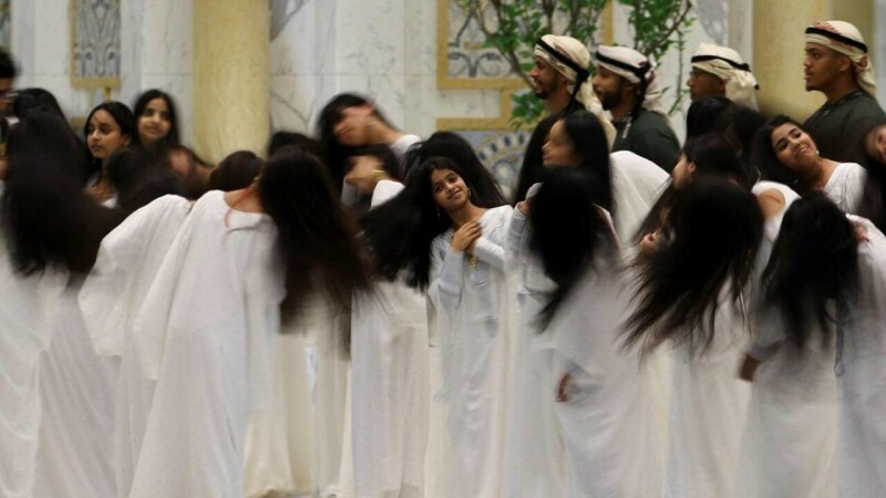 What was the hair-tossing dance that welcomed Trump to the UAE?
