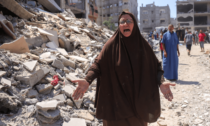  A Palestinian woman reacts next to the rubble of the Shaheen family home, in the Saftawi neighbourhood, west of Jabalia, in the northern Gaza Strip, after it was targeted in an Israeli strike on June 9, 2025. &mdash; AFP 