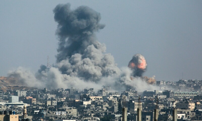 A column of fire and smoke erupts following Israeli bombardment of areas east of the Tuffah neighbourhood in eastern Gaza City on June 18, 2025. — AFP