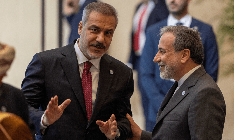  Iranian FM Abbas Araghchi talks with Turkish FM Hakan Fidan during the 51st Session of the Council of Foreign Ministers of the Organisation of Islamic Cooperation (OIC) in Istanbul on June 21, 2025. &mdash; Reuters/Umit Bektas 