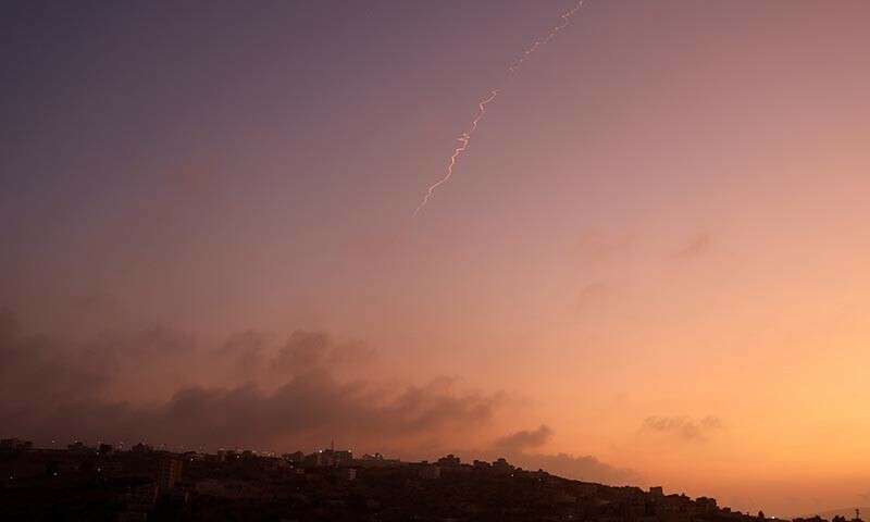 A missile launched from Iran towards Israel is seen from Tubas, amid the Iran-Israel conflict, in the Israeli-occupied West Bank on June 24. &mdash; Reuters