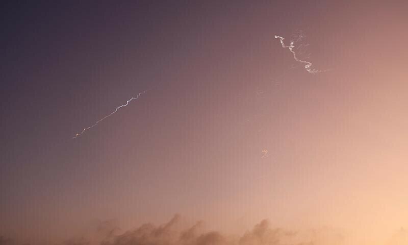 Missiles launched from Iran towards Israel are seen from Tubas, amid the Iran-Israel conflict, in the Israeli-occupied West Bank on June 24. &mdash; Reuters
