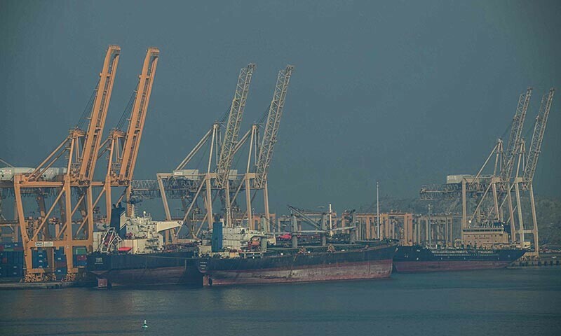 Tankers are seen at the Khor Fakkan Container Terminal, the only natural deep-sea port in the region and one of the major container ports in the Sharjah Emirate, along the Strait of Hormuz, a waterway through which one-fifth of global oil output passes on June 23. &mdash; AFP