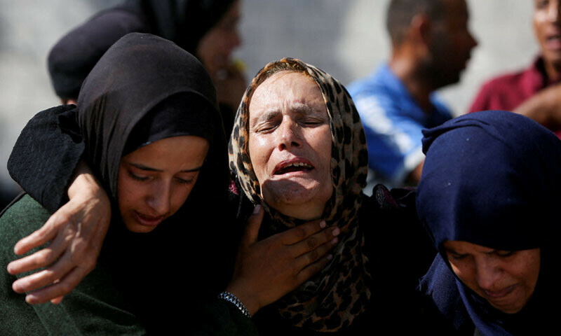 Mourners attend the funeral of Palestinians killed in Israeli attacks on a school sheltering displaced people in Gaza on July 3, 2025. &mdash; Reuters
