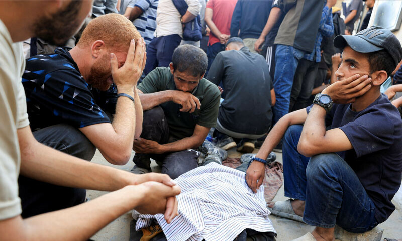 Mourners react during the funeral of Palestinians killed in an overnight Israeli strike on a tent and nd on people seeking aid at Nasser Hospital in Khan Younis, southern Gaza on July 3, 2025. &mdash; Reuters