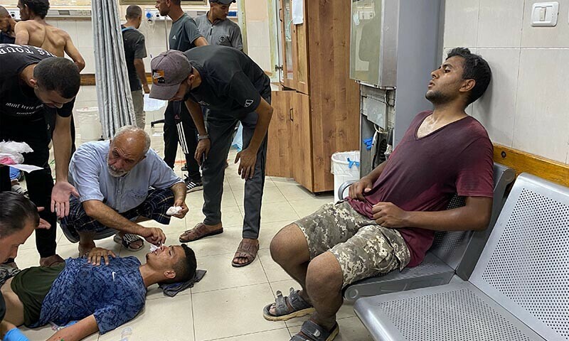 Palestinians wounded in gunfire as people were receiving humanitarian aid in Rafah wait for first aid treatment at the congested Nasser Hospital in Khan Younis in the southern Gaza Strip on July 3, 2025. — AFP